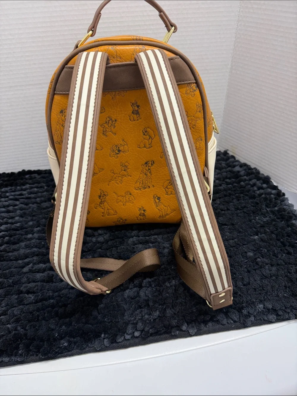 Loungefly Disney tan and brown Lady and the Tramp Paw Accent Mini Backpack